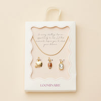 Box set view - Gold snake necklace with football, helmet and rectangle clear rhinestone charm