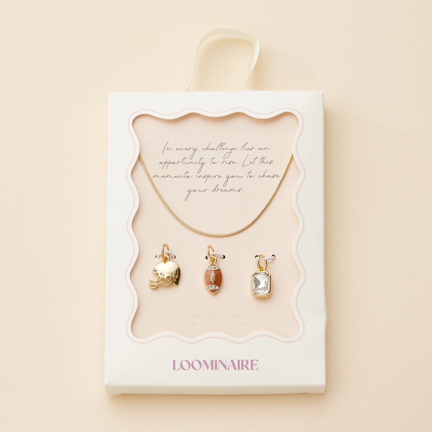 Box set view - Gold snake necklace with football, helmet and rectangle clear rhinestone charm