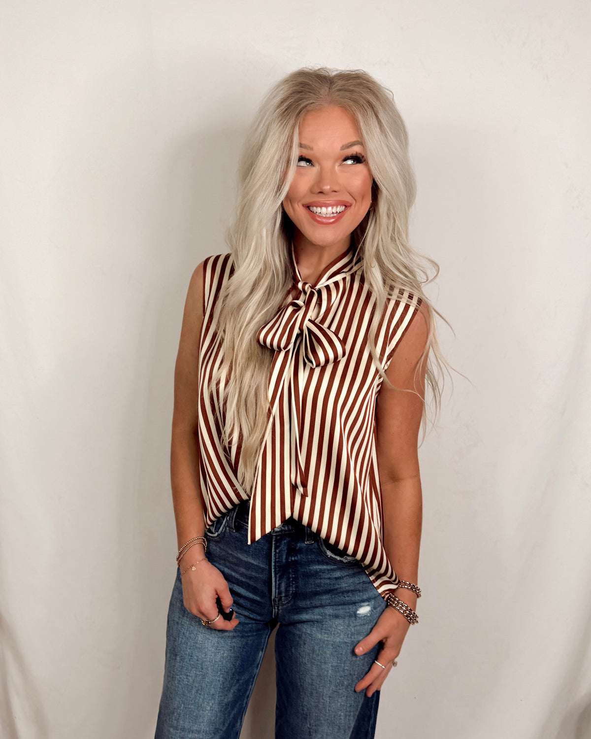 Sierra Sleek Satin Striped Sleeveless Neck Tie Blouse in Brown
