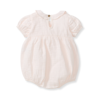 Back view pink baby bubble romper with short sleeves on a white background