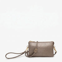 Silver clutch bag with a strap on a white background