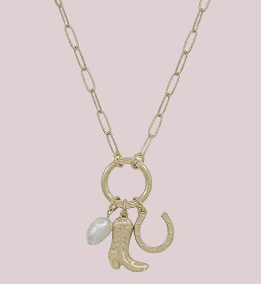 gold link necklace with charm holder  holding a pearl, boot and horseshoe charms