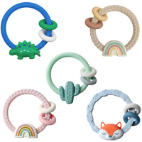 Itzy Ritzy Rattle™ Silicone Teether Rattles: Highland Cow